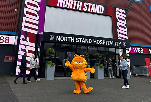 Garfield has a ball at Burnley match